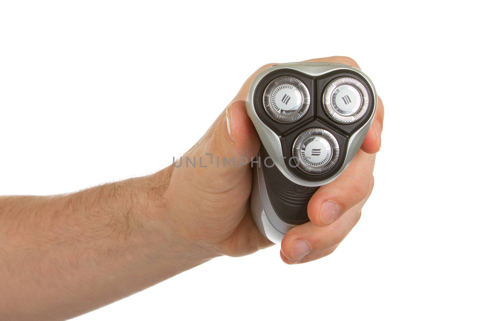 Hand holding an electric shaver isolated over a white background