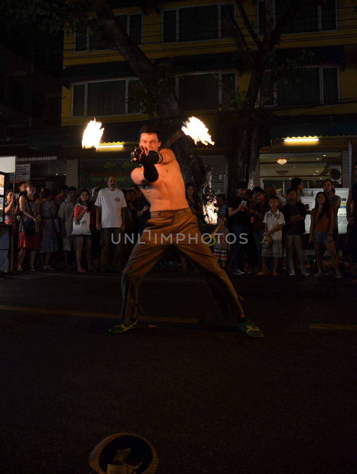 BANGKOK - DEC 16: Crowd walk through the Phra Athit Walking Stre by siraanamwong