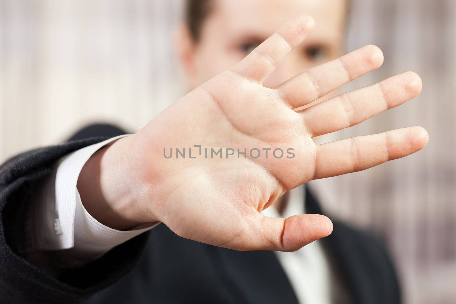 Shy business men hand gesture hide face stop sign