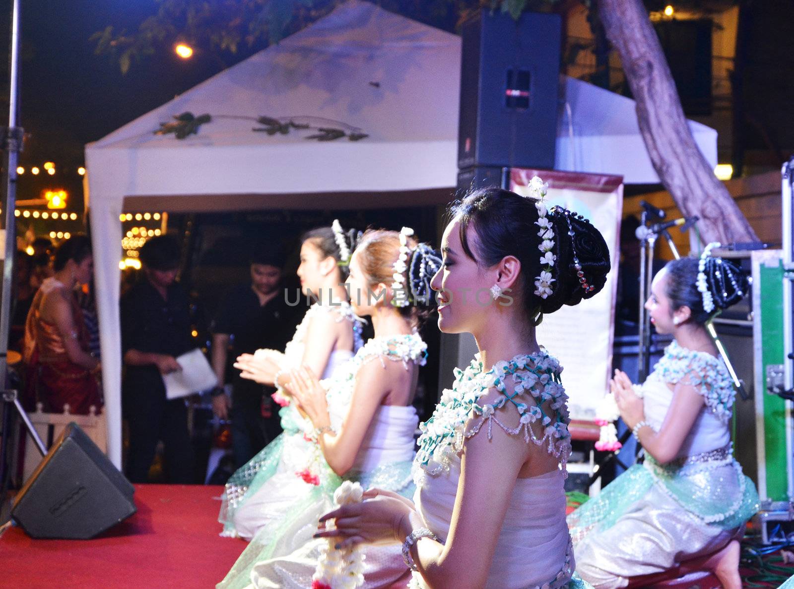 BANGKOK - DEC 16:Traditional Thai Dance at Phra Athit Walking Street, "Rattanakosin recall" festival on December 16, 2012 in Bangkok, Thailand. Its a tourist attraction primarily for night life and entertainment 