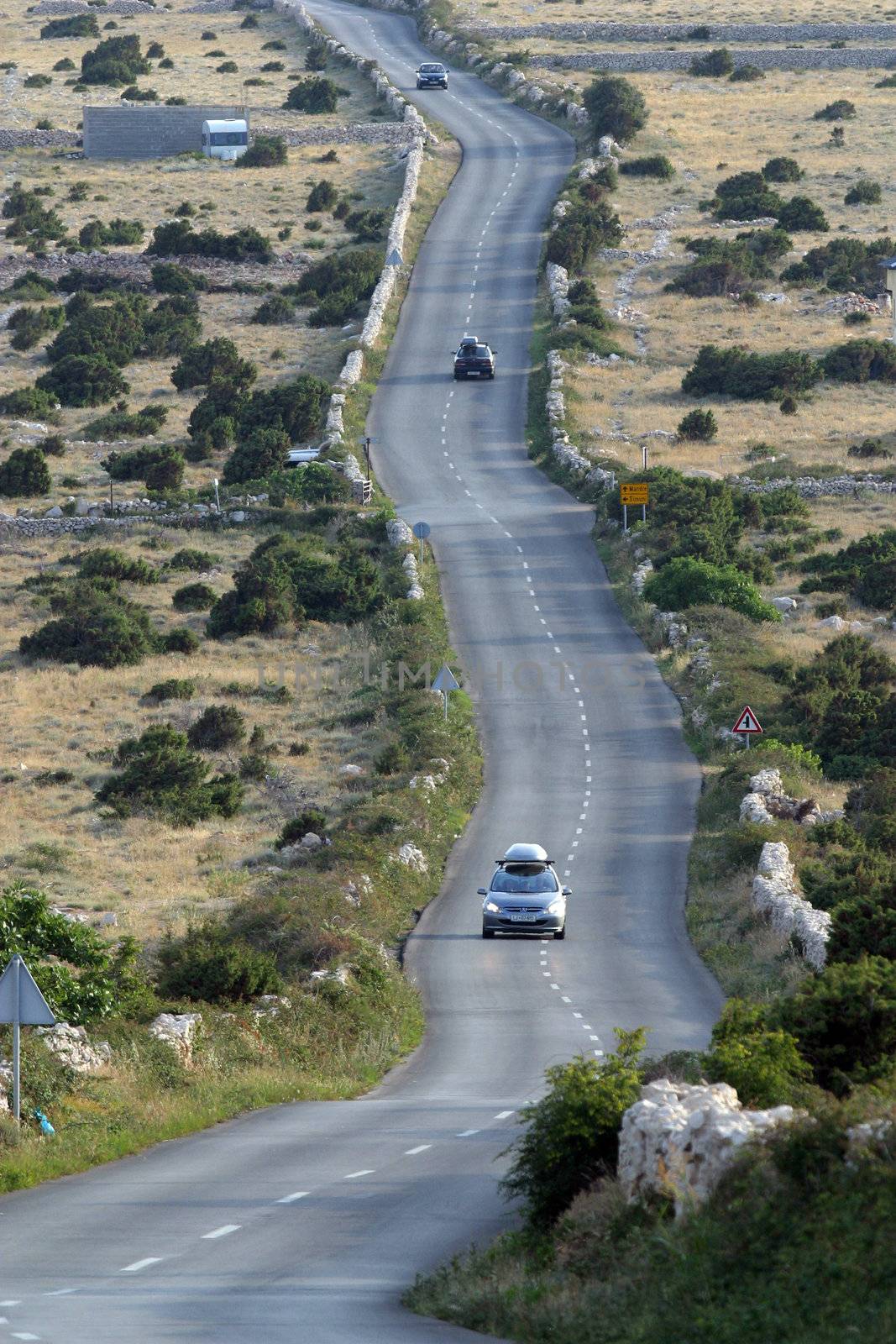 Asphalt winding road, Island of Pag, Croatia.