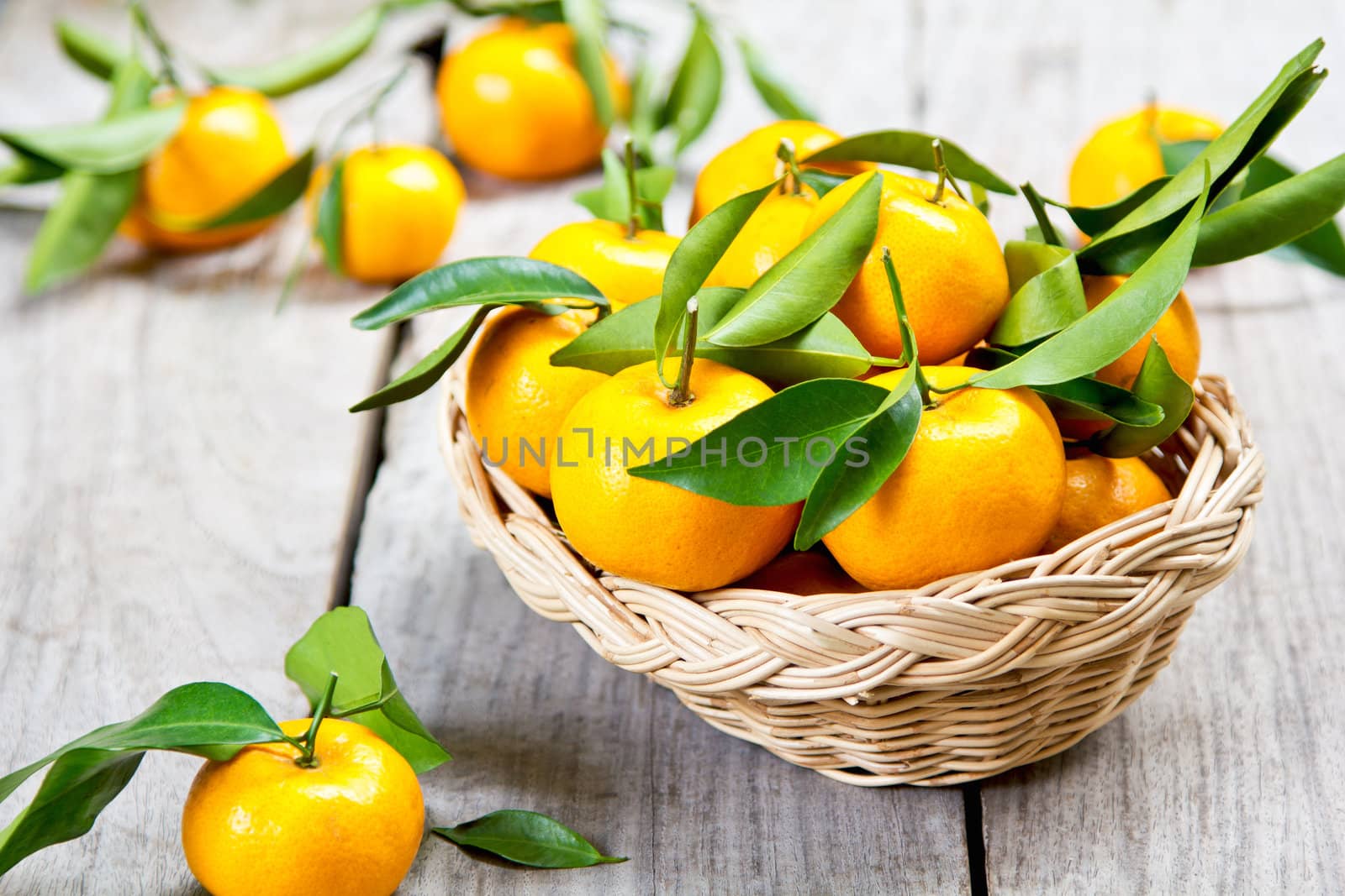 Fresh Oranges in bamboo basket