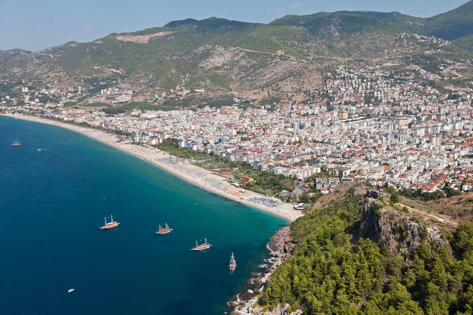 Summer vacations - blue Mediterranean sea and Cleopatra sand beach resort of Turkey Alanya view from ancient mountain castle wall