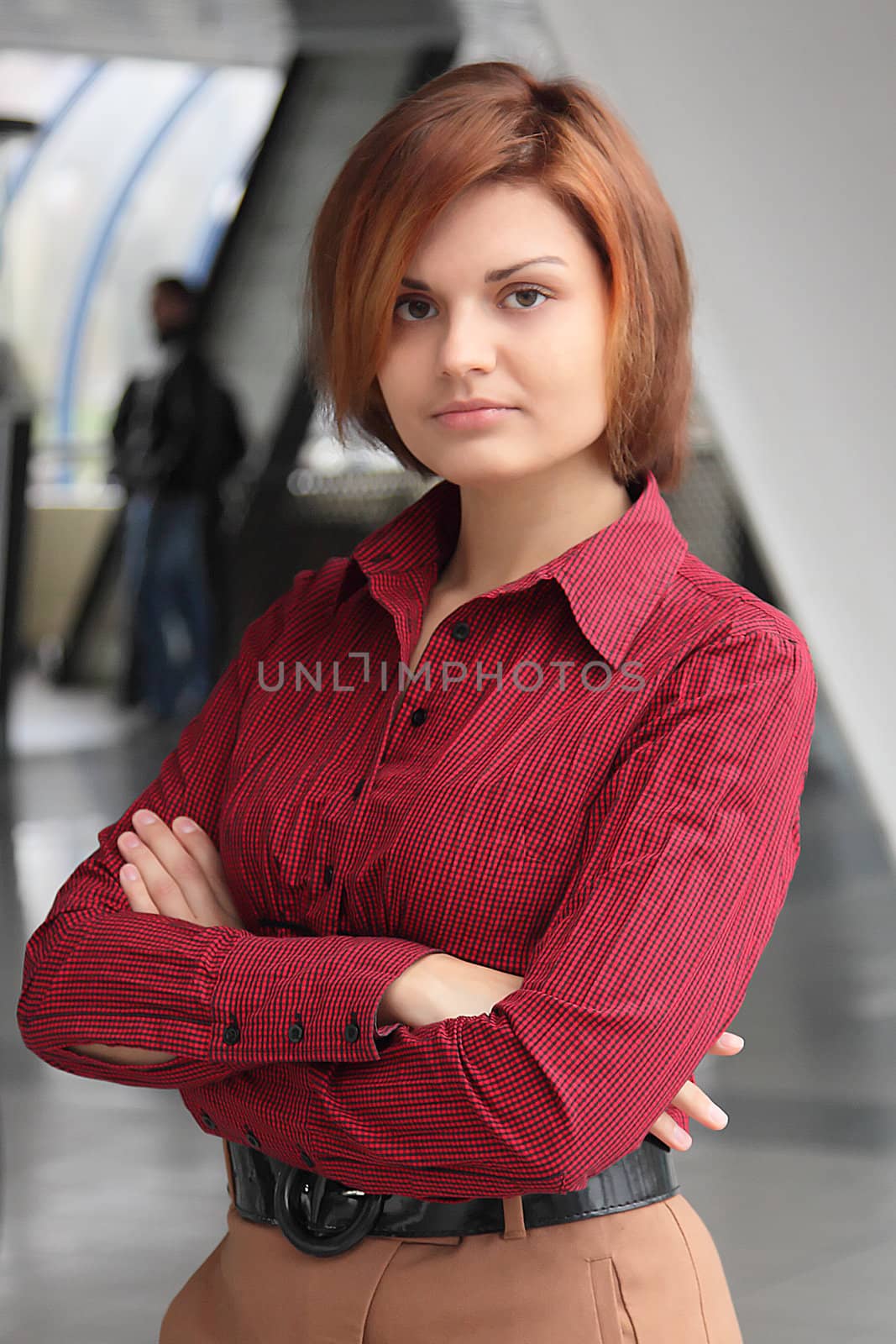 Portrait of the beautiful and young business woman