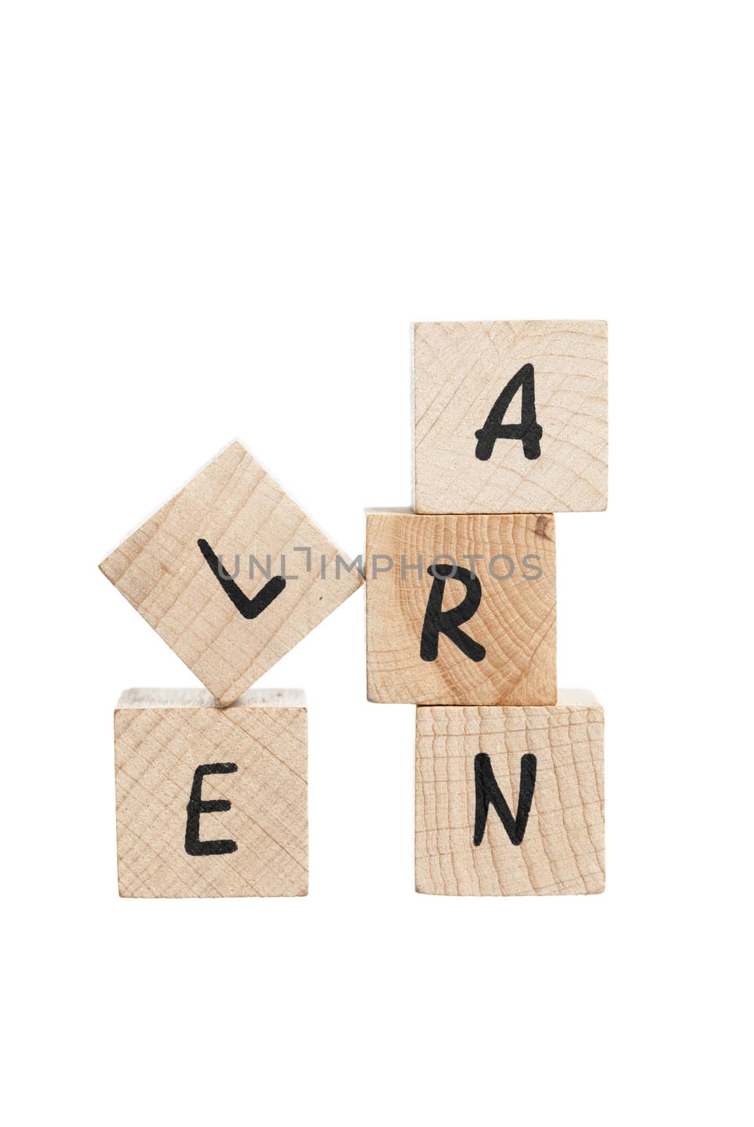 Learn spelled out with wooden blocks. White background.