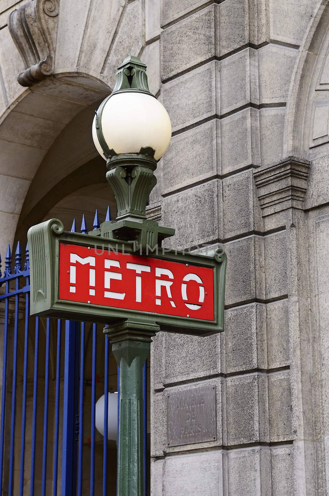 Red and green metro sign in Paris France