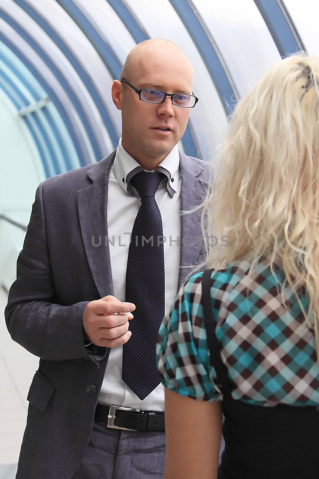 Business man and the woman discuss the project