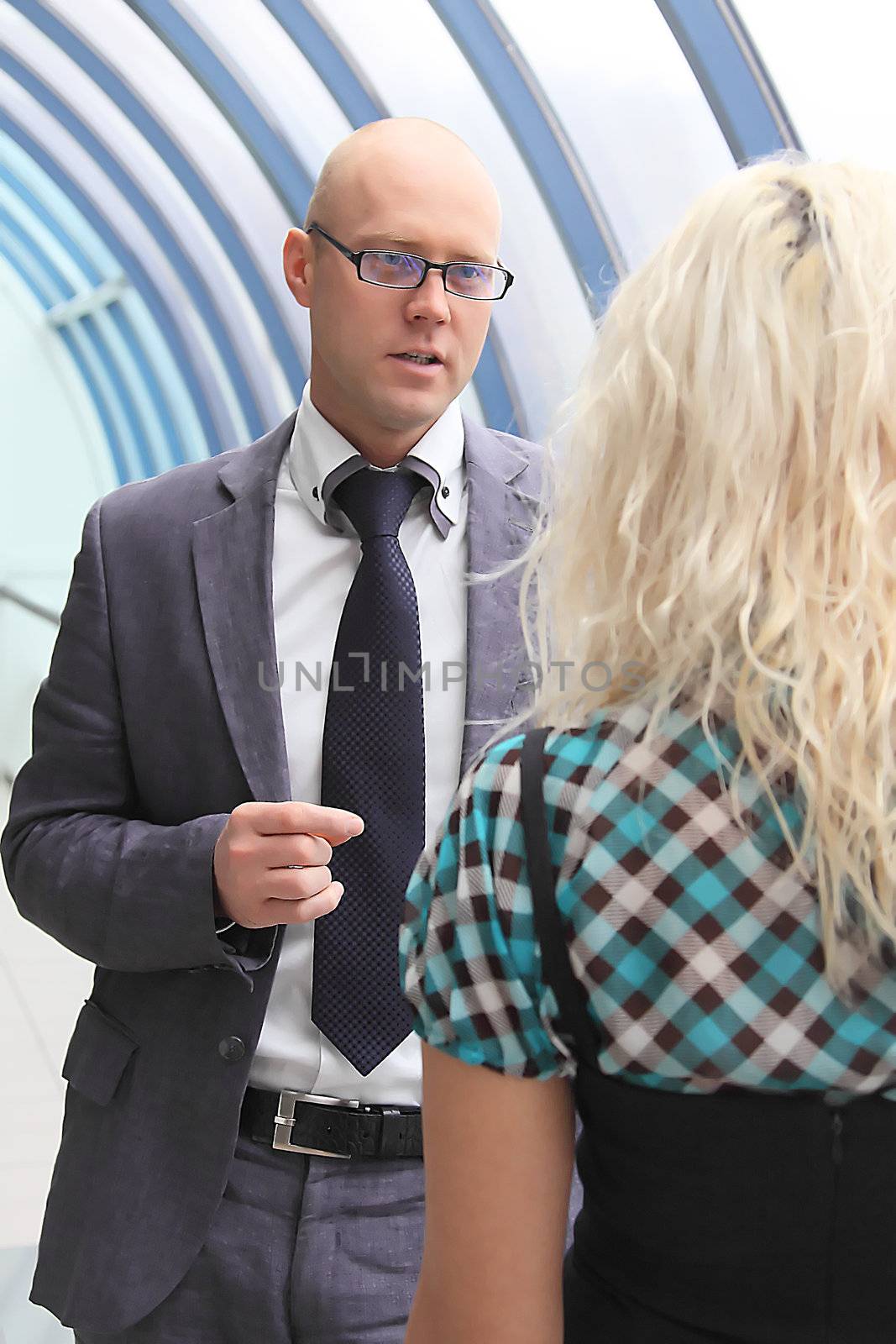 Business man and the woman discuss the project