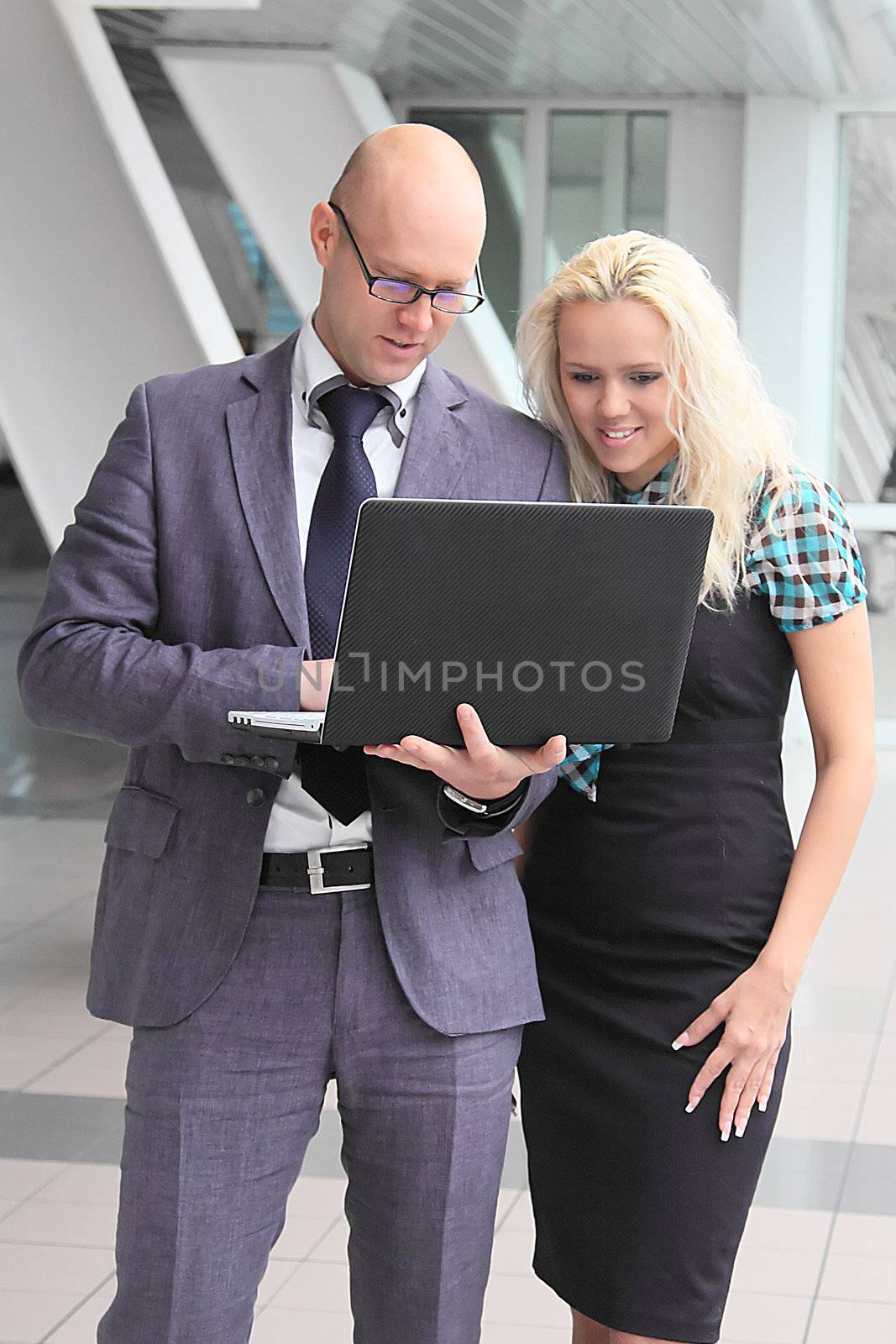 Business man and the woman discuss the project