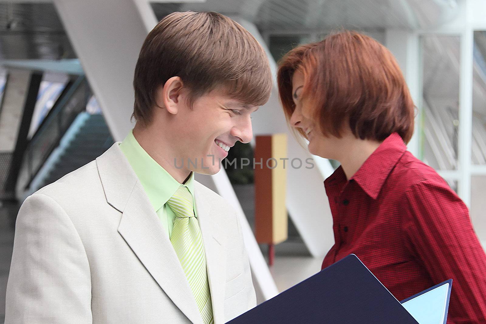 Business man and the woman discuss the project