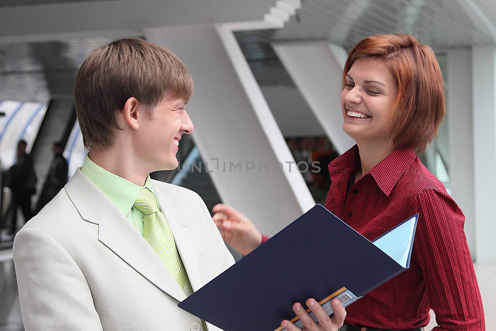 Business man and the woman discuss the project