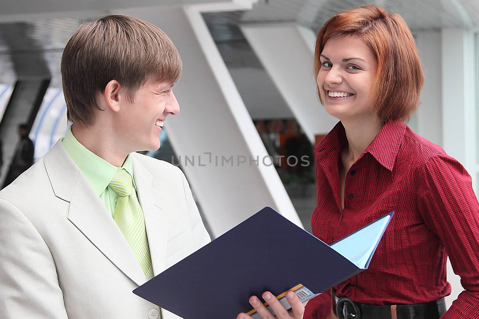 Business man and the woman discuss the project