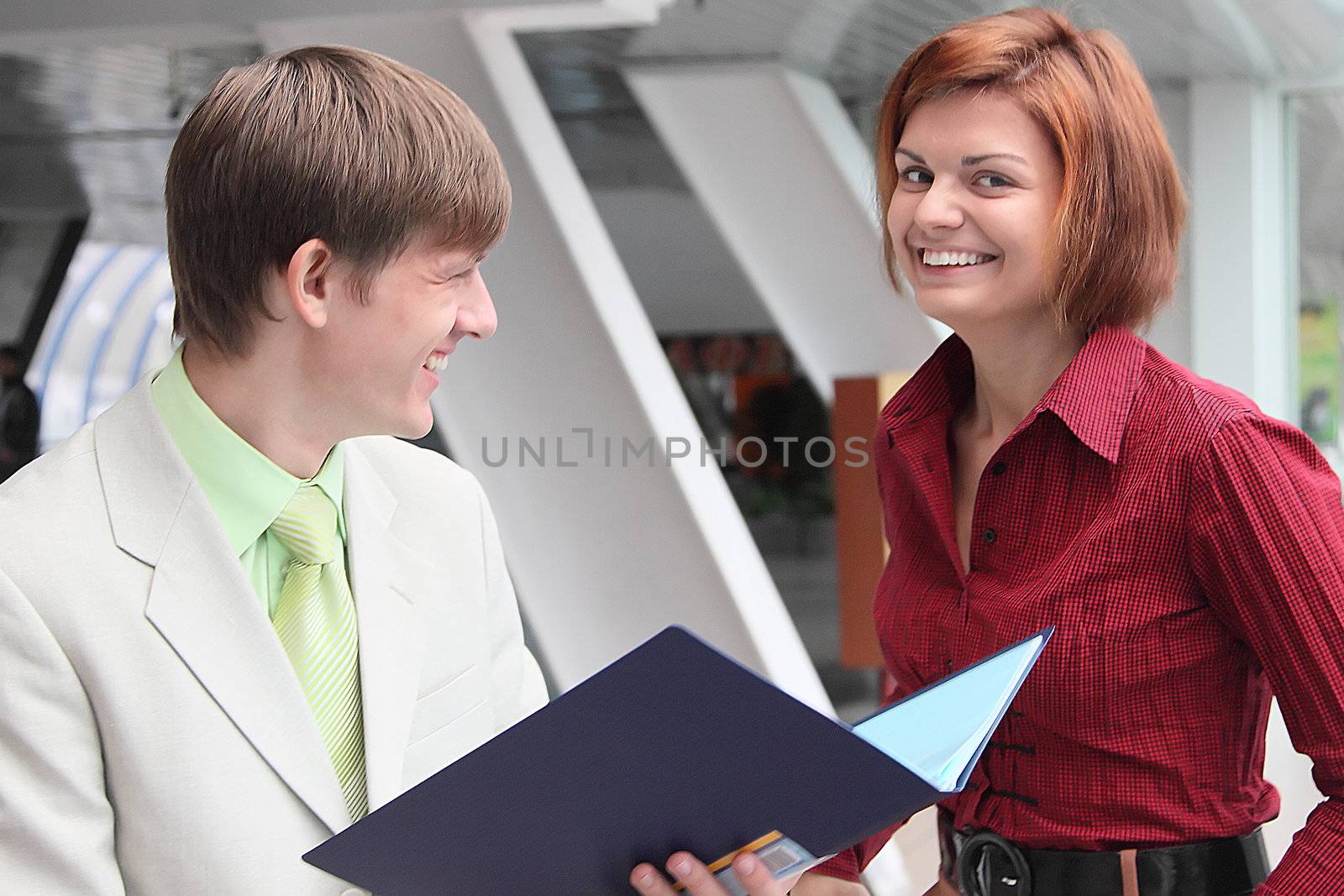 Business man and the woman discuss the project