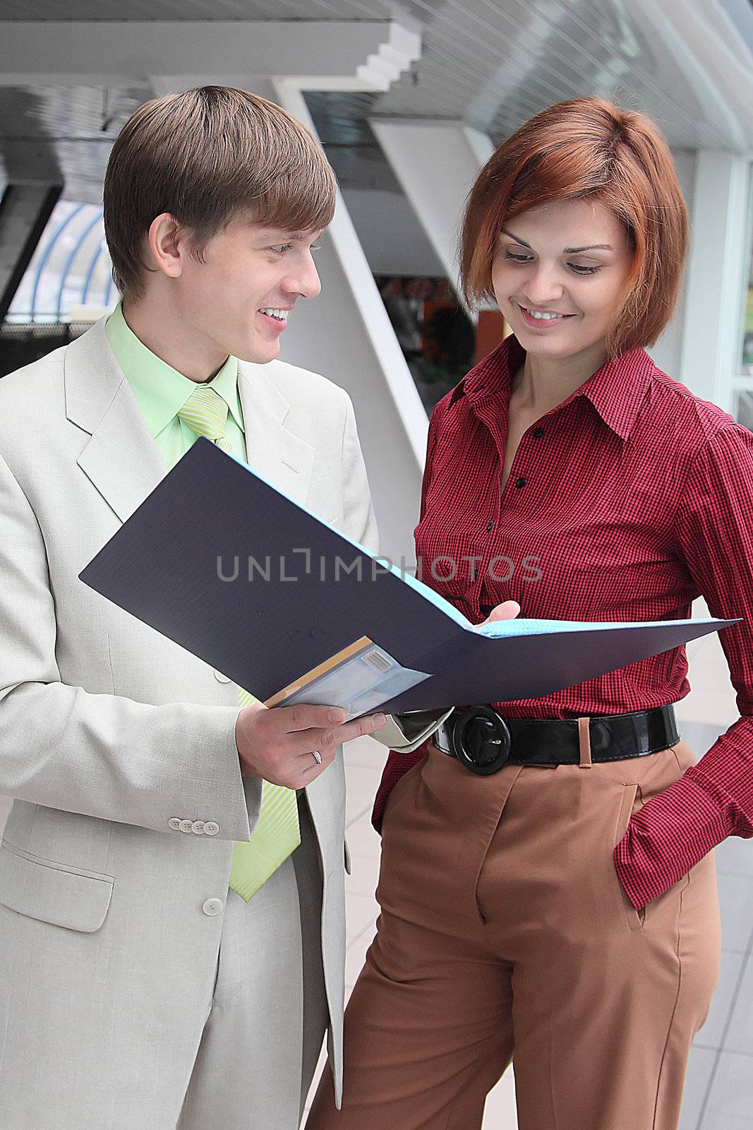 Business man and the woman discuss the project