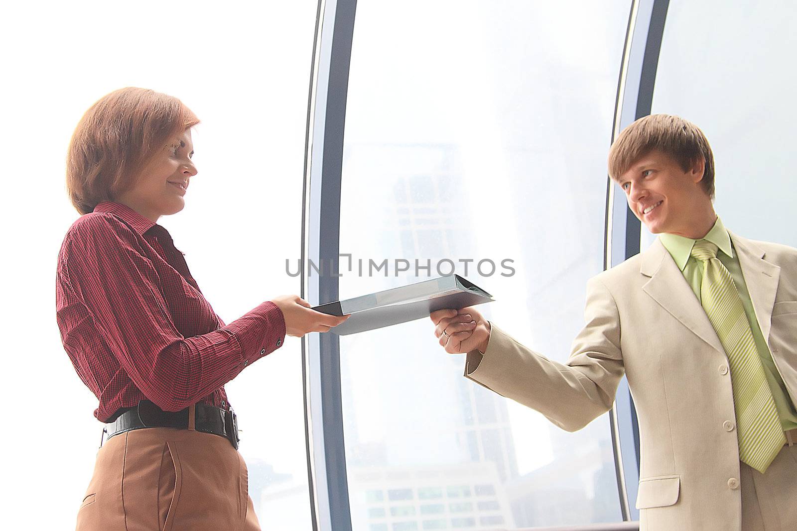Business man and the woman discuss the project