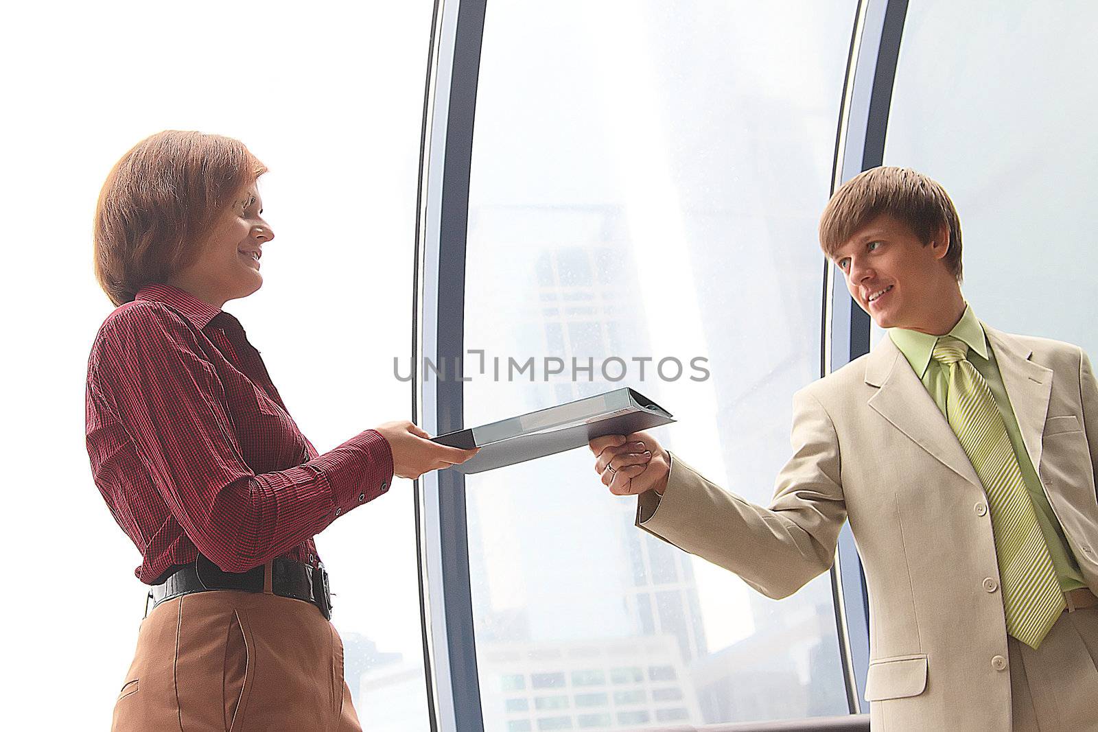 Business man and the woman discuss the project