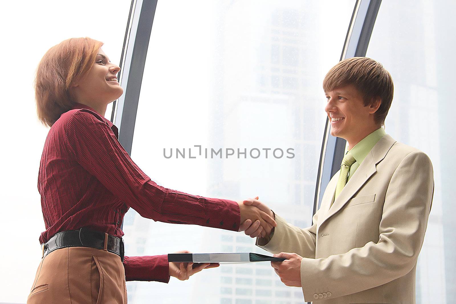 Business man and the woman discuss the project