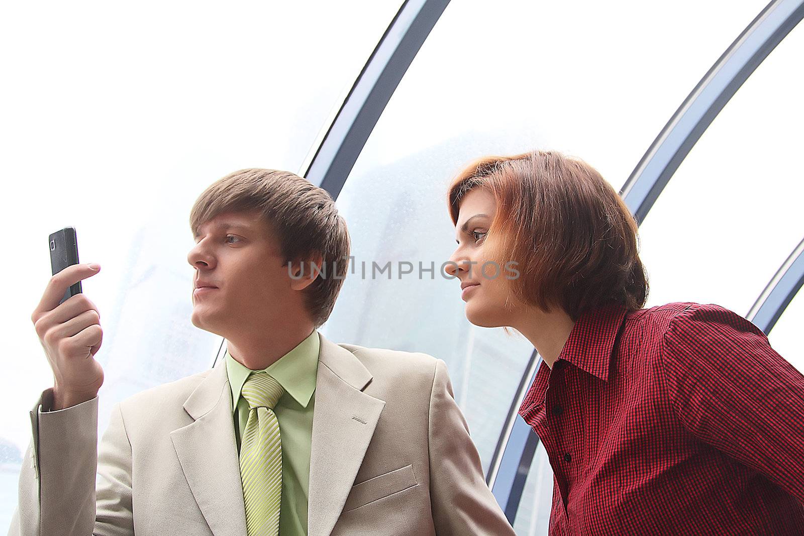 Business man and the woman discuss the project
