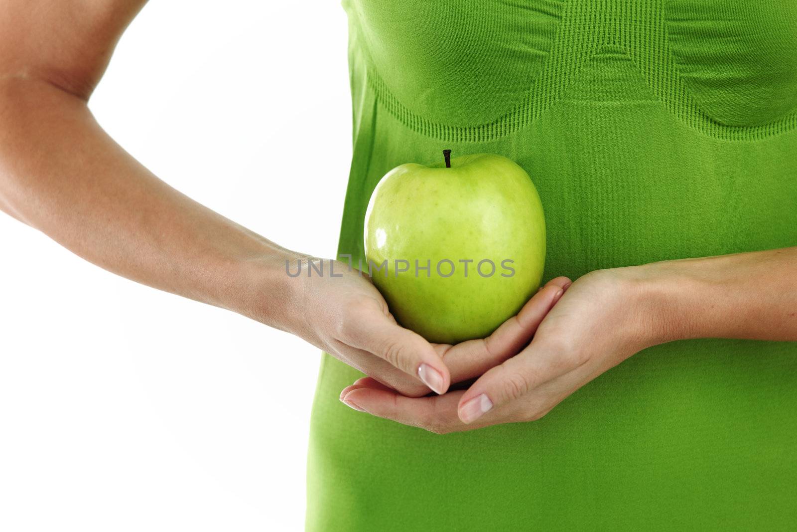 green apple in woman hands