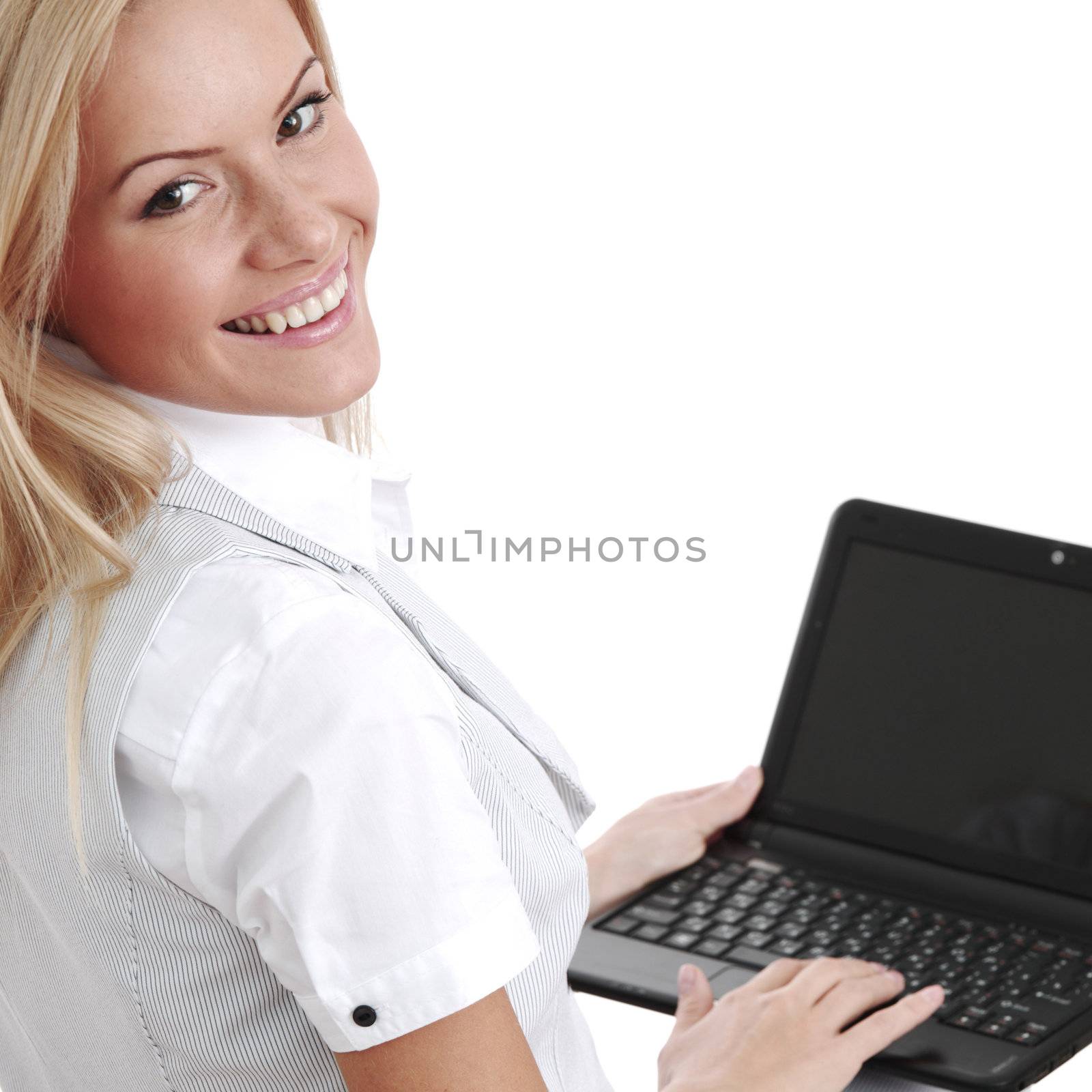 business woman lies and working on laptop