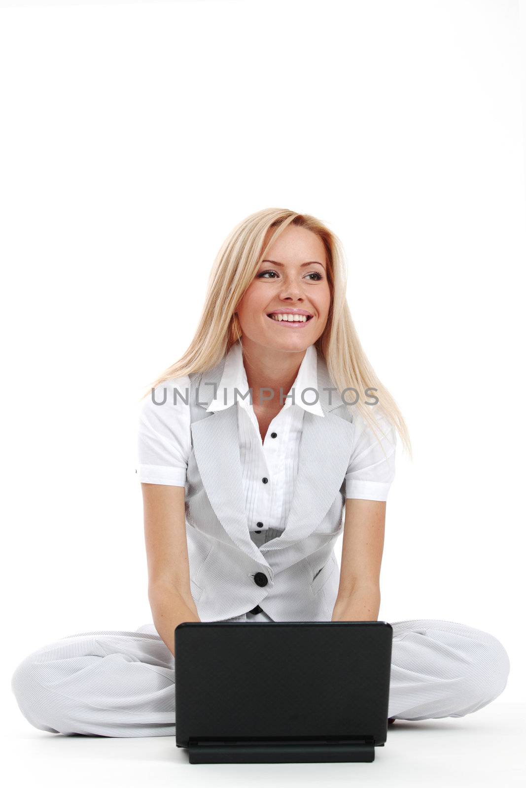 business woman lies and working on laptop