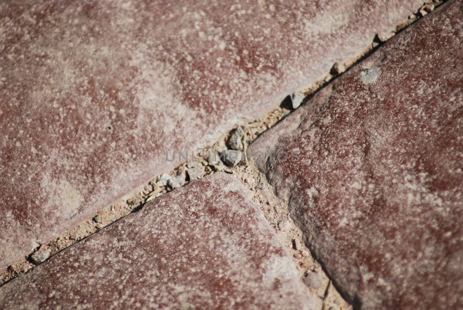 texture of red paving stone close up by svtrotof