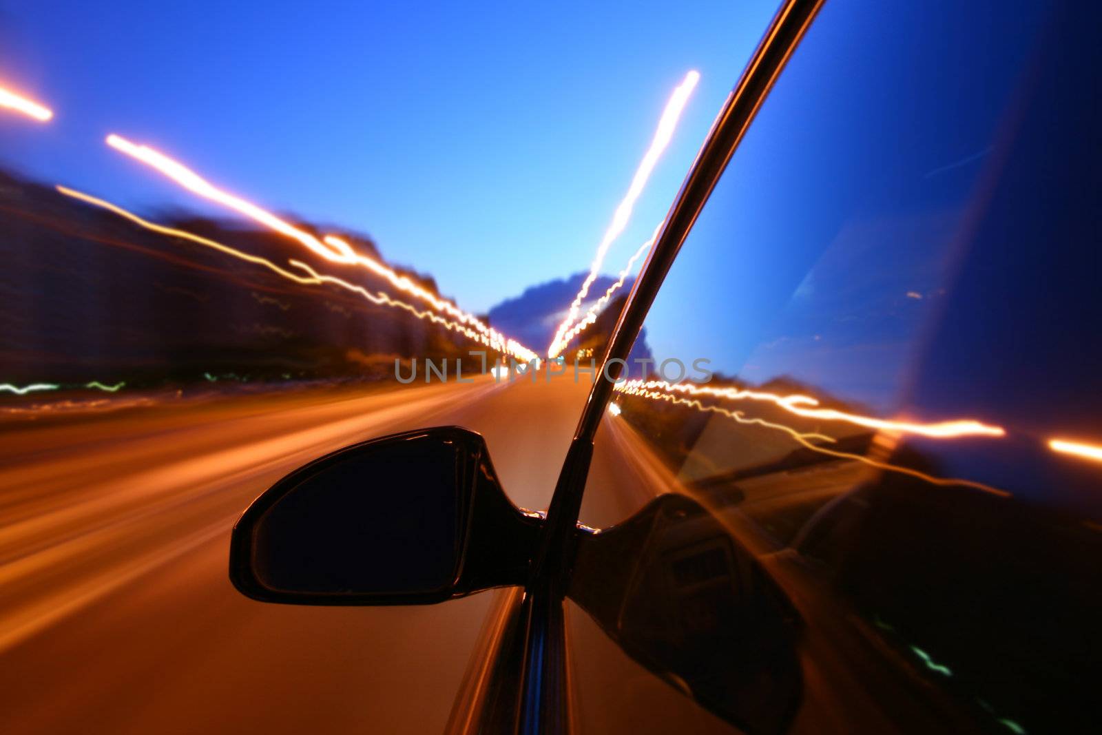speed drive on car at night motion blurred
