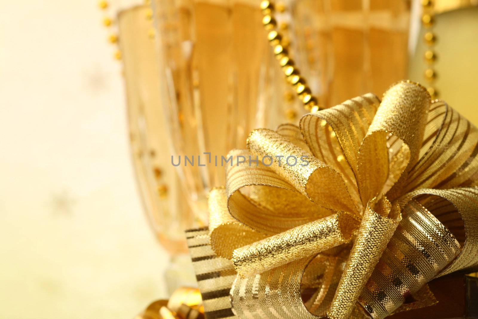 holiday card golden champagne and gift