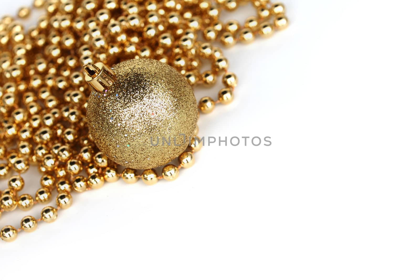  golden christmas ball isolated on white