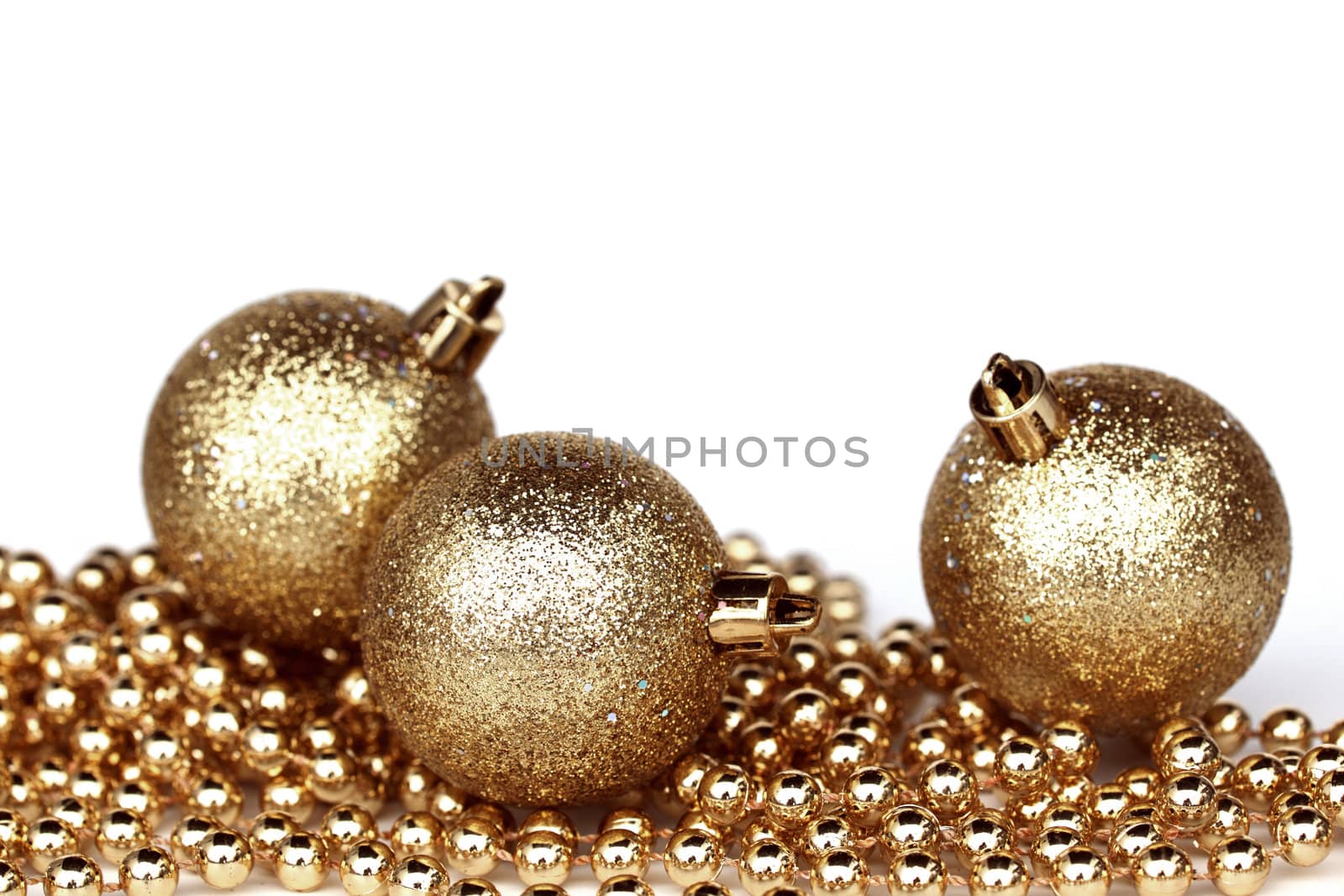  golden christmas ball isolated on white