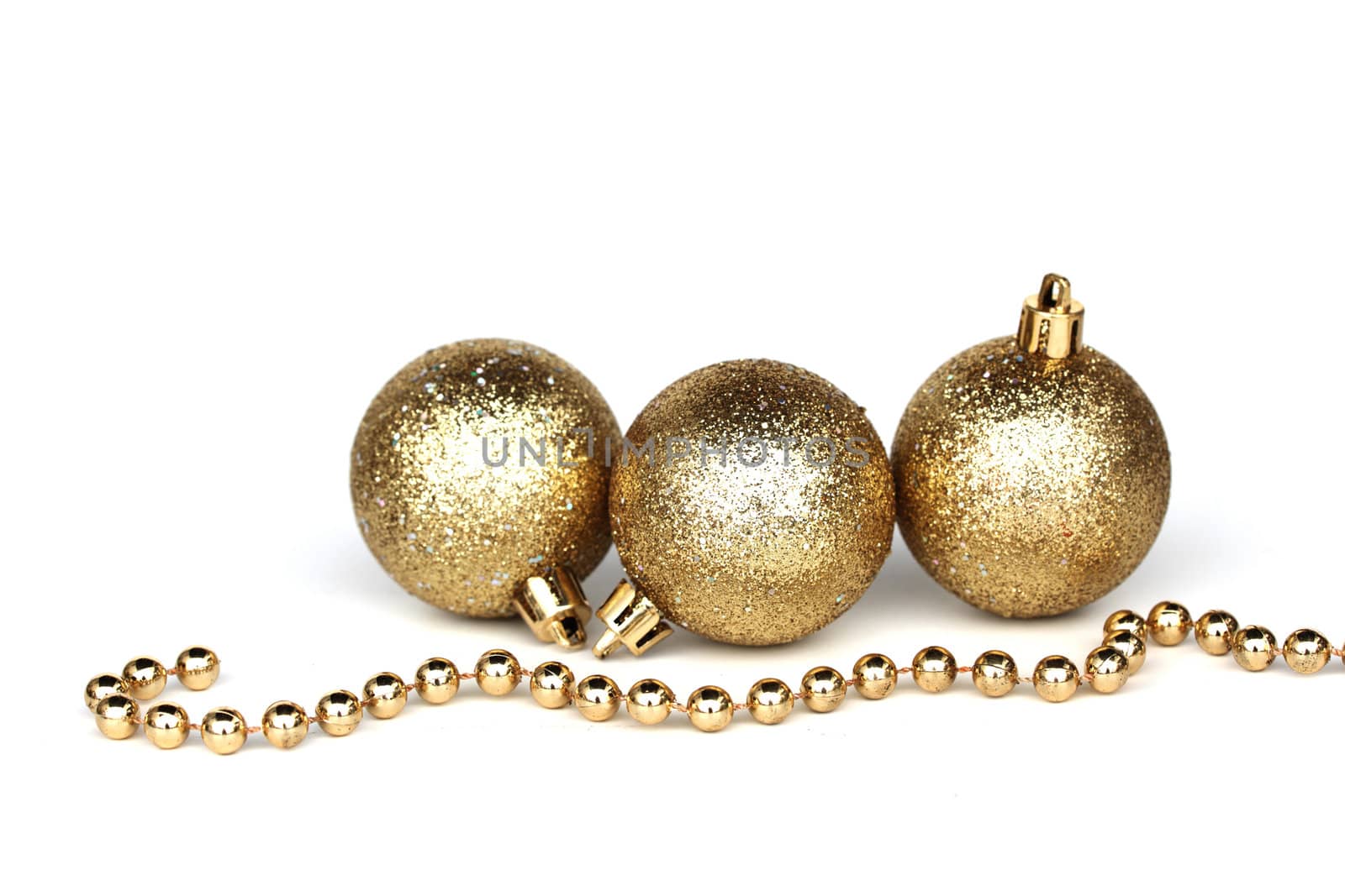  golden christmas ball isolated on white