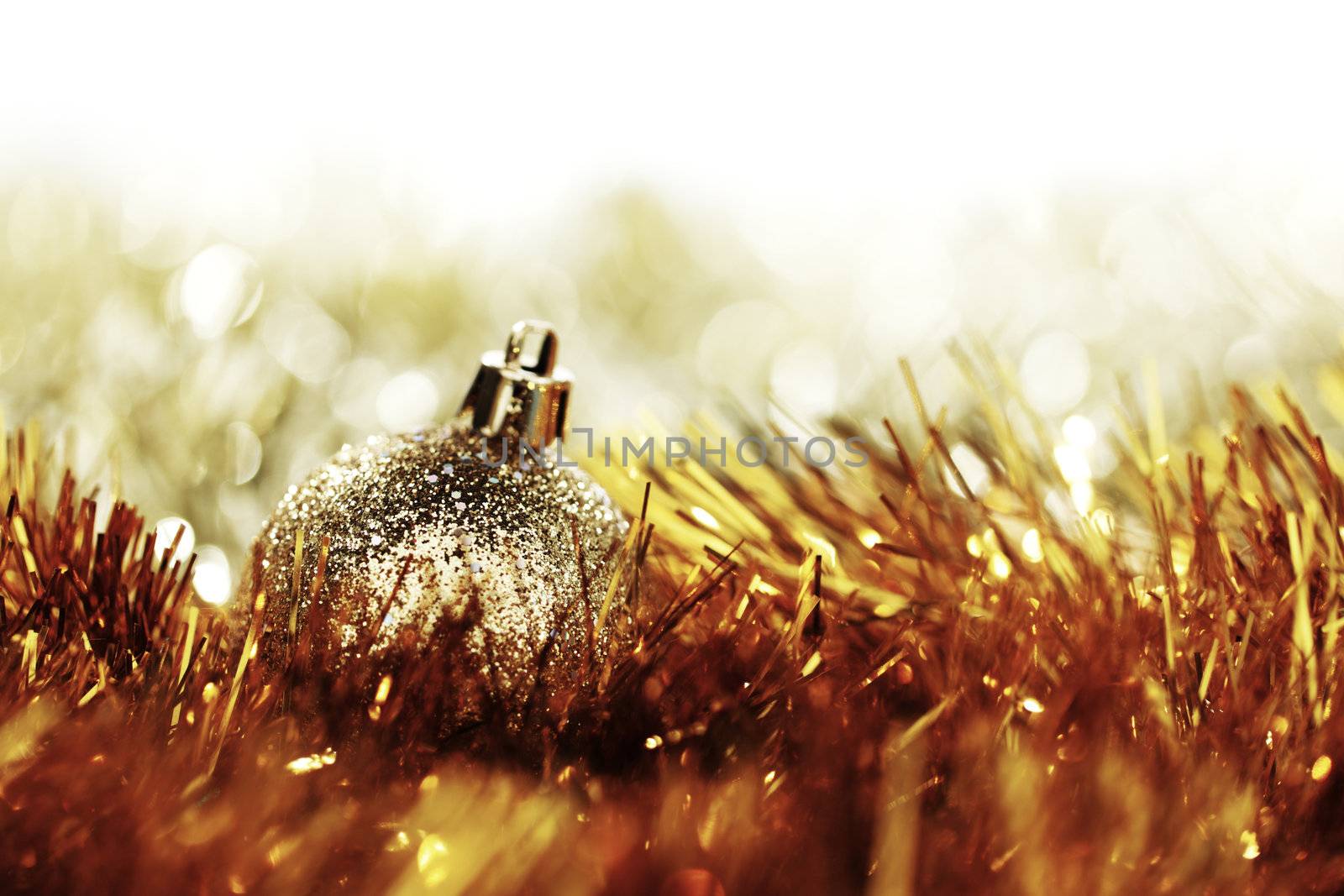 golden christmas ball on christmas background