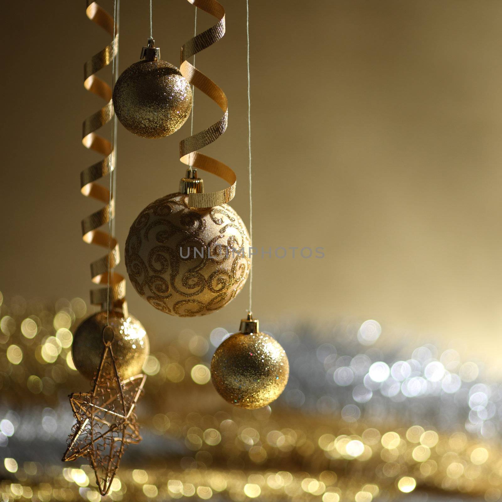 golden christmas balls on bokeh background