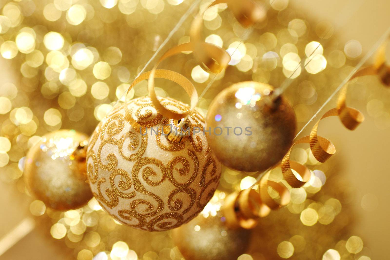 golden christmas balls on bokeh background