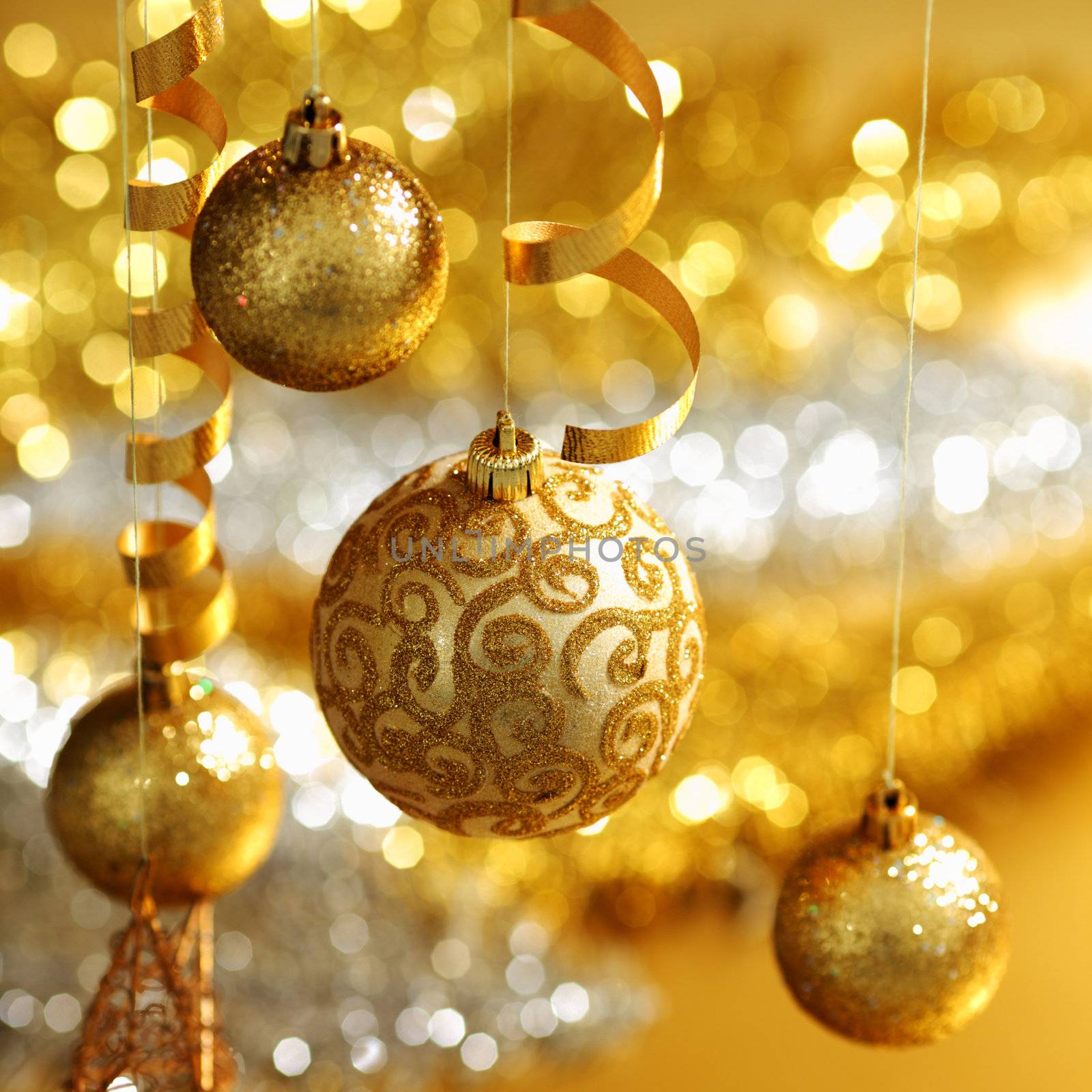 golden christmas balls on bokeh background