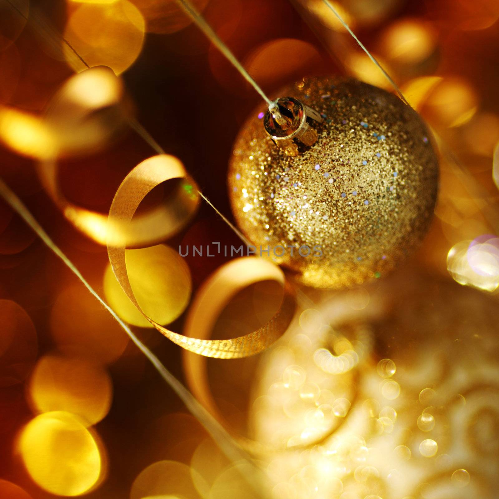 golden christmas balls on bokeh background