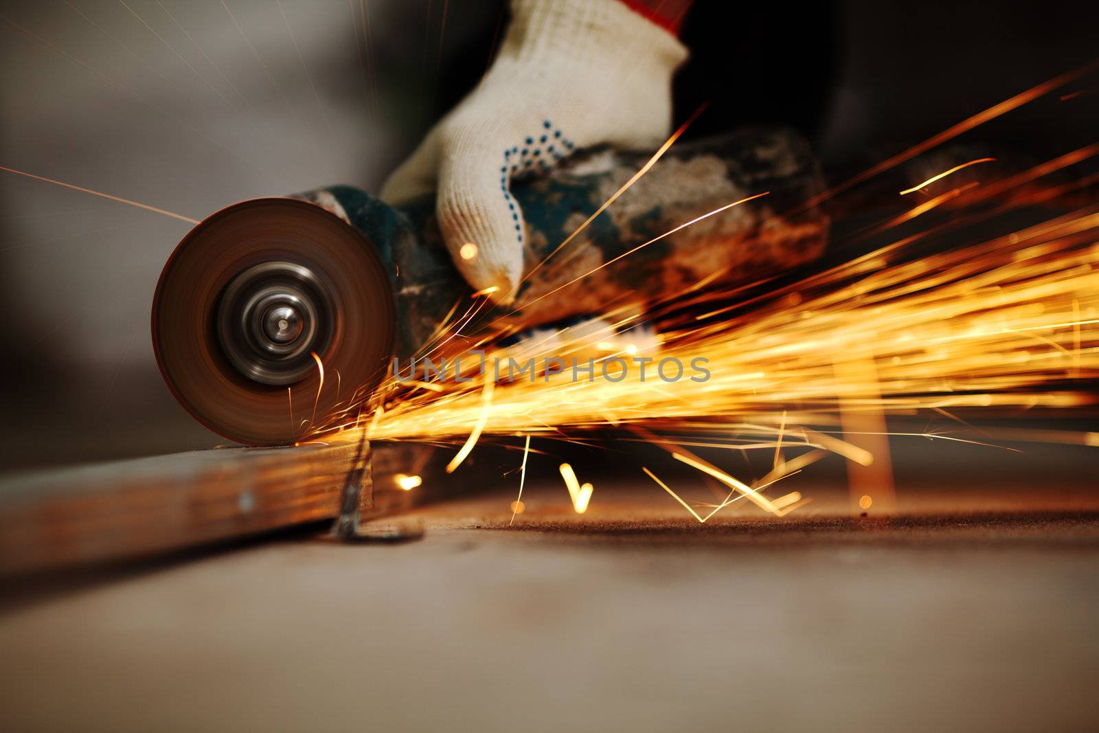 metal sawing close up sparks spray