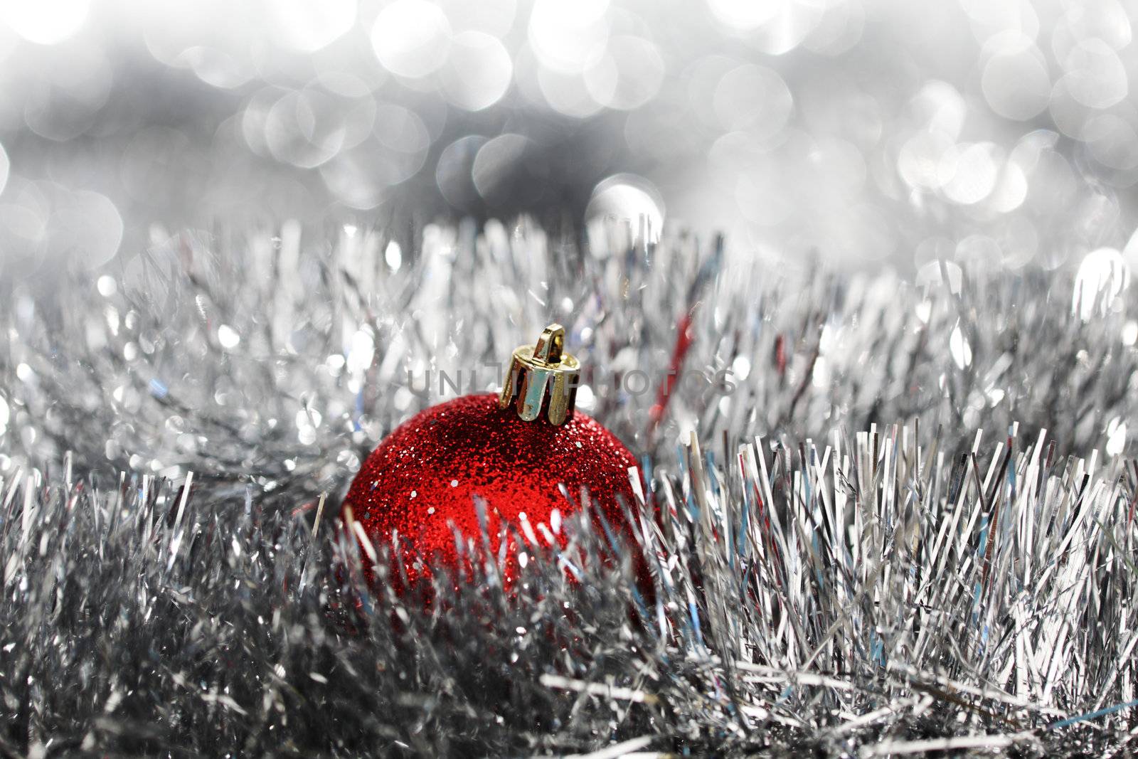 red christmas ball on holiday background