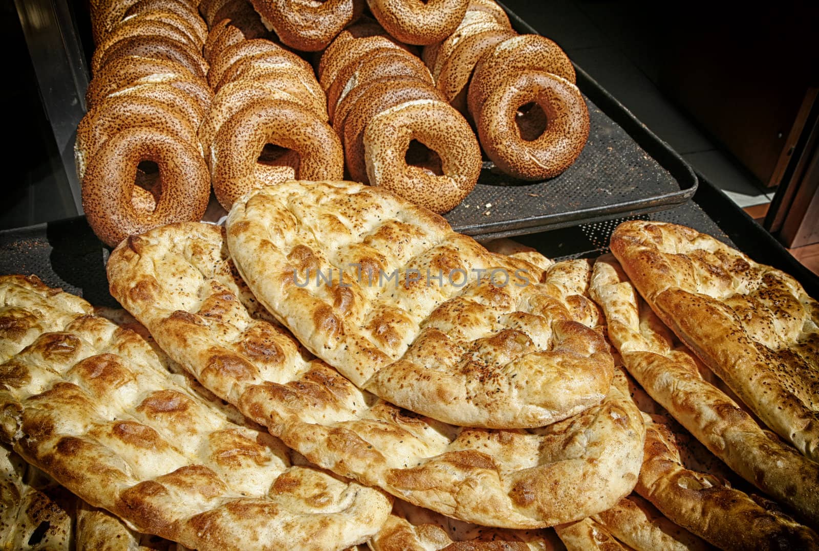 Freshly baked bread in the doorway of a bakers shop in Istanbul, Turkey.
