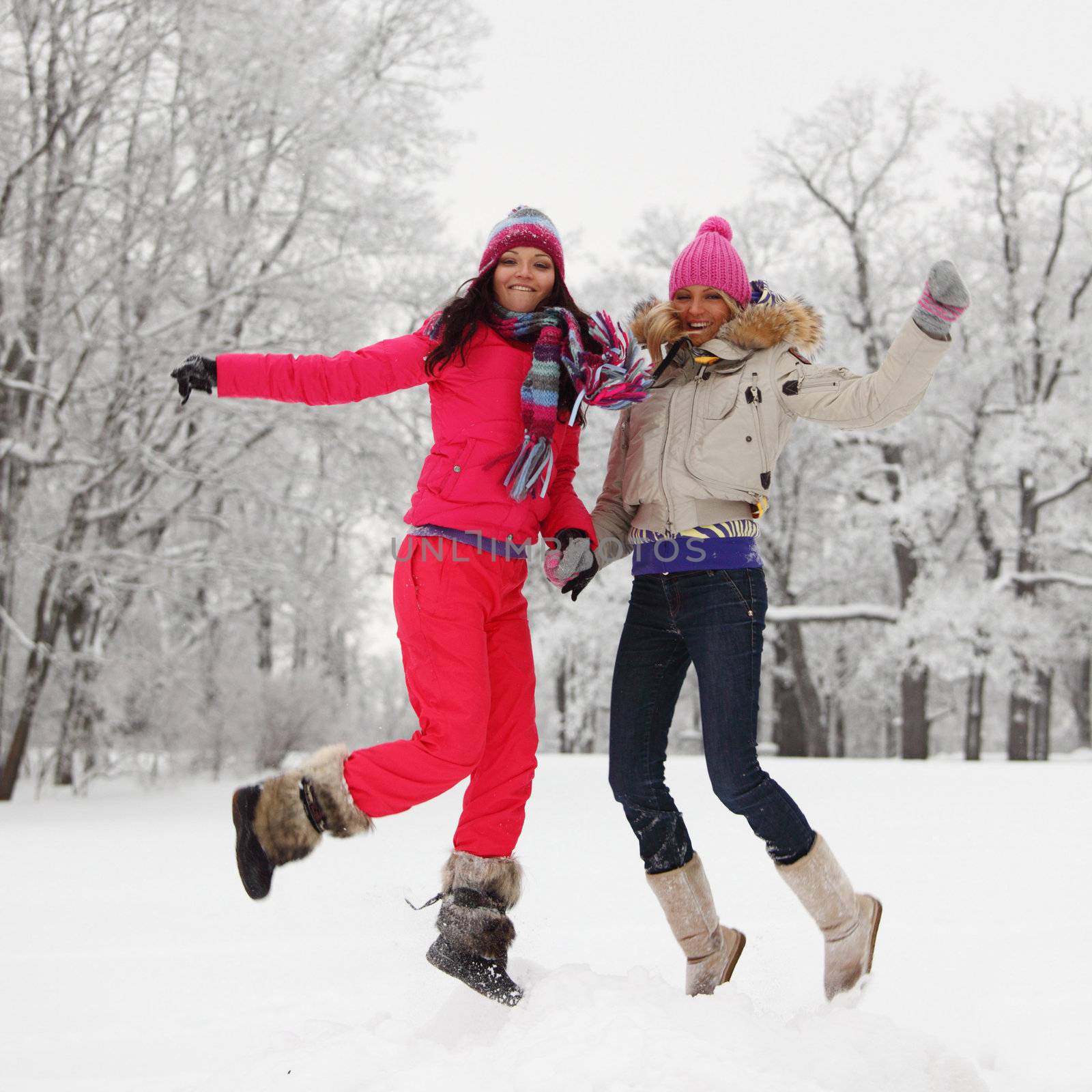 winter girl jump on snow background