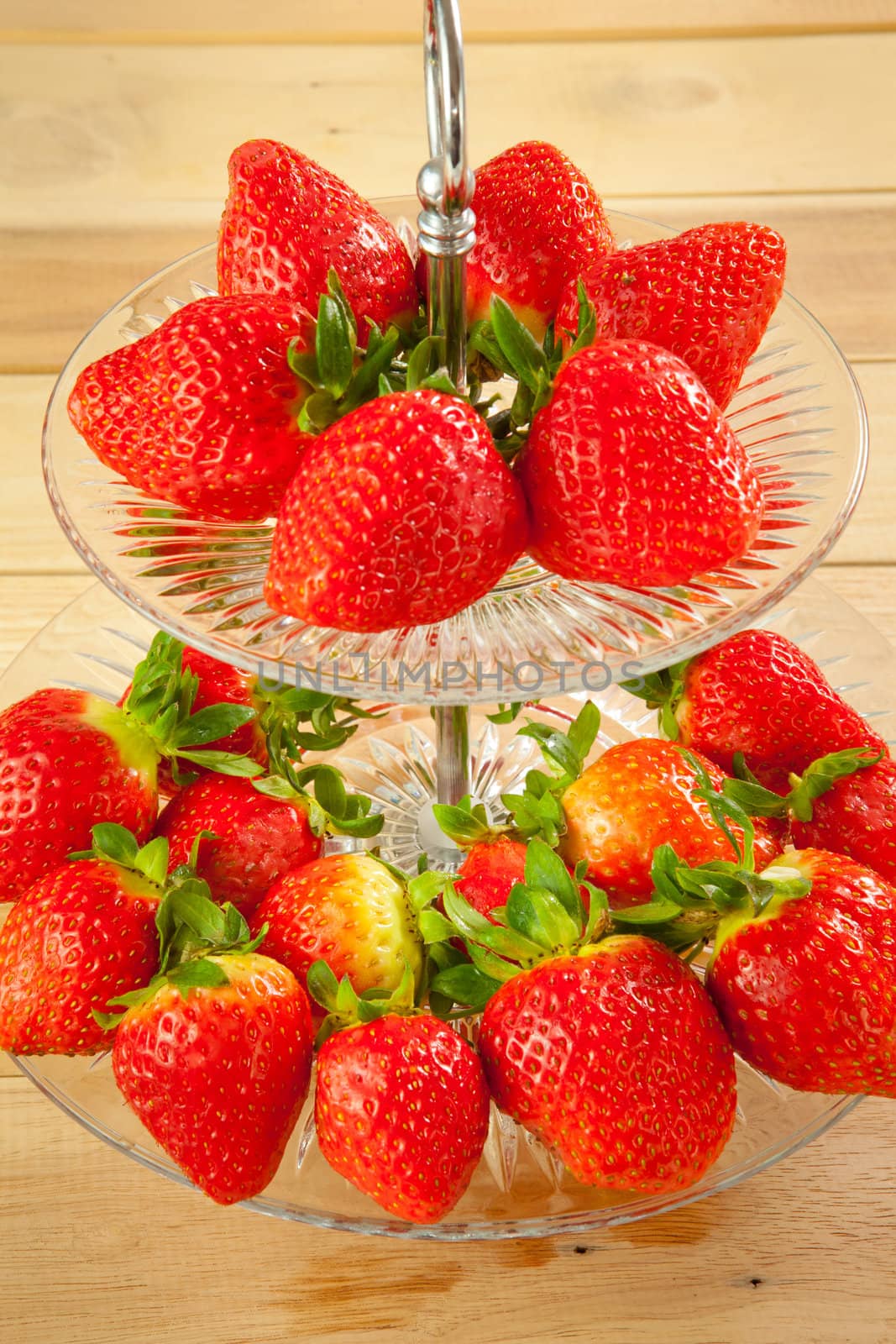 Red strawberries on old wood table