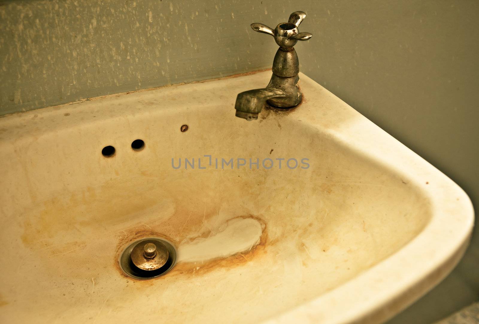 Closeup of old rusty dirty water drain