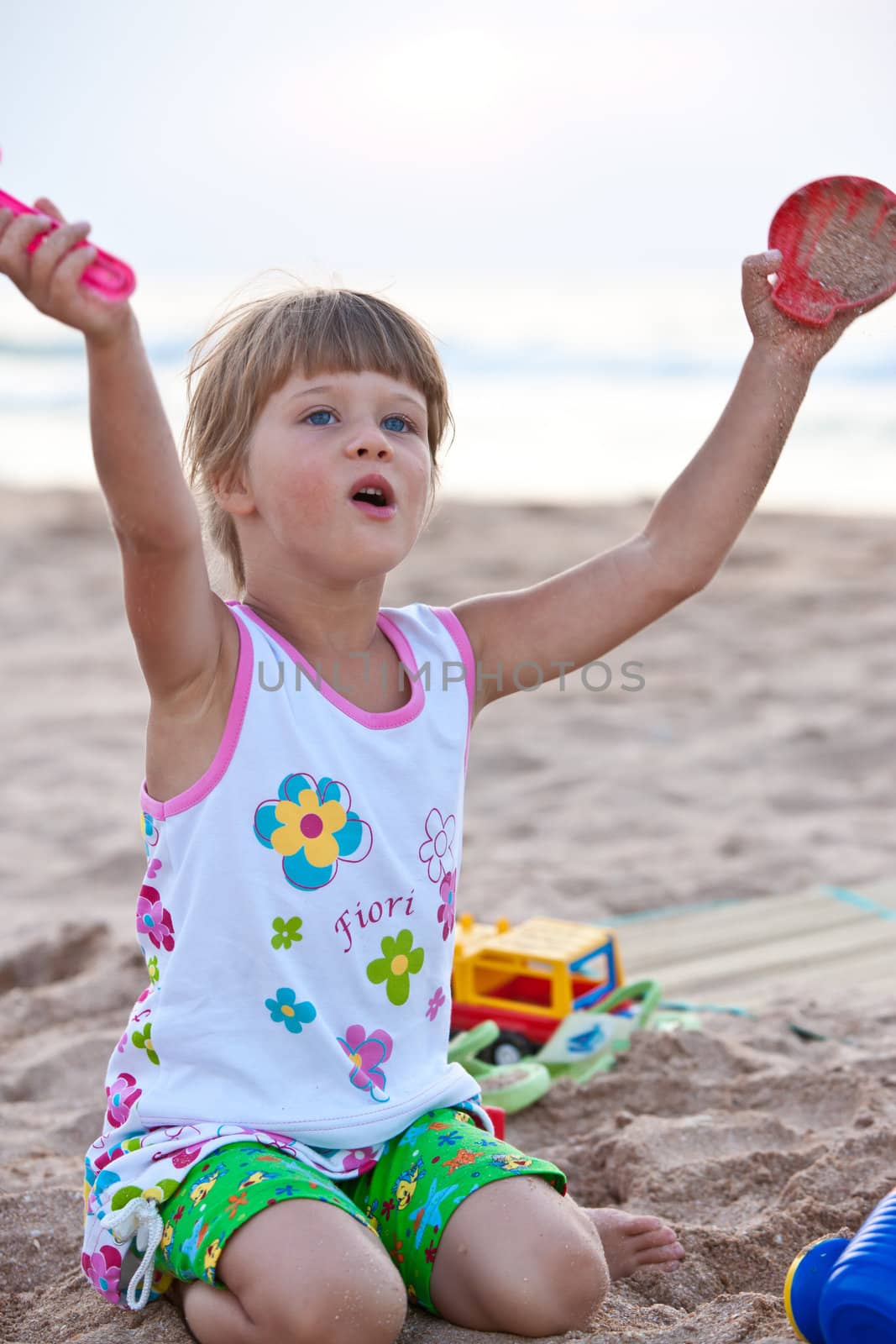 people series: little girl play the game on the beach