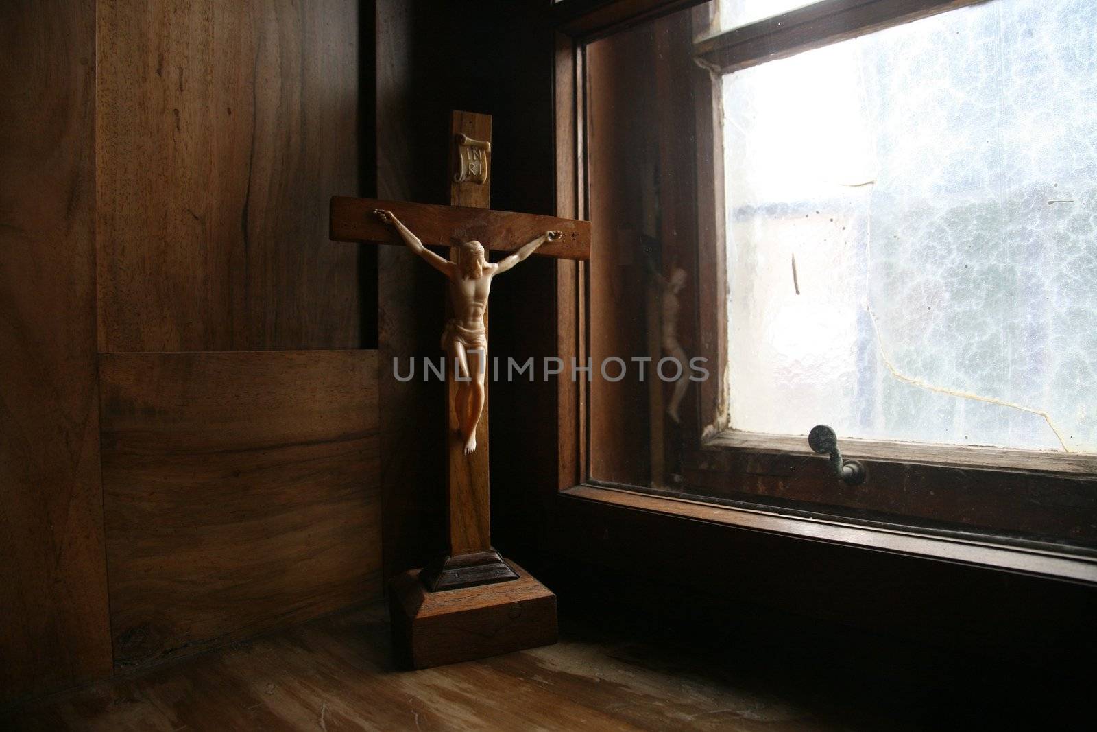 Cross at the window
