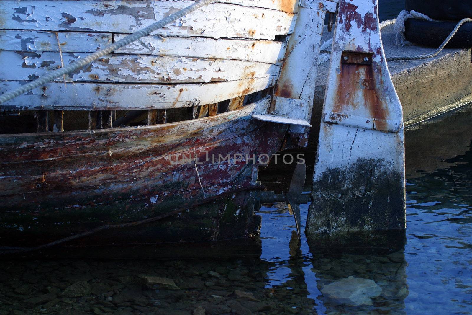 The steering helm of an old fishing boat