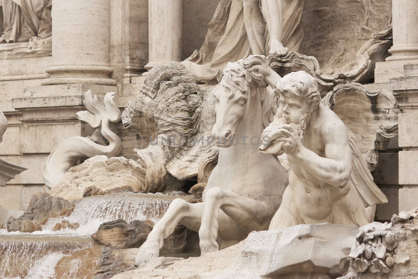 Detail of statues adorning the Trevi Fountain in Rome, Italy