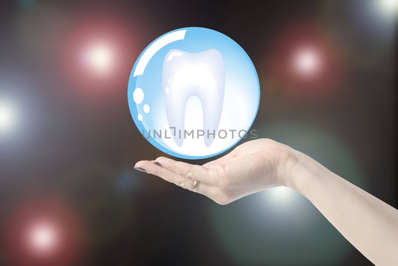 hands holding tooth in glass sphere, dentistry  