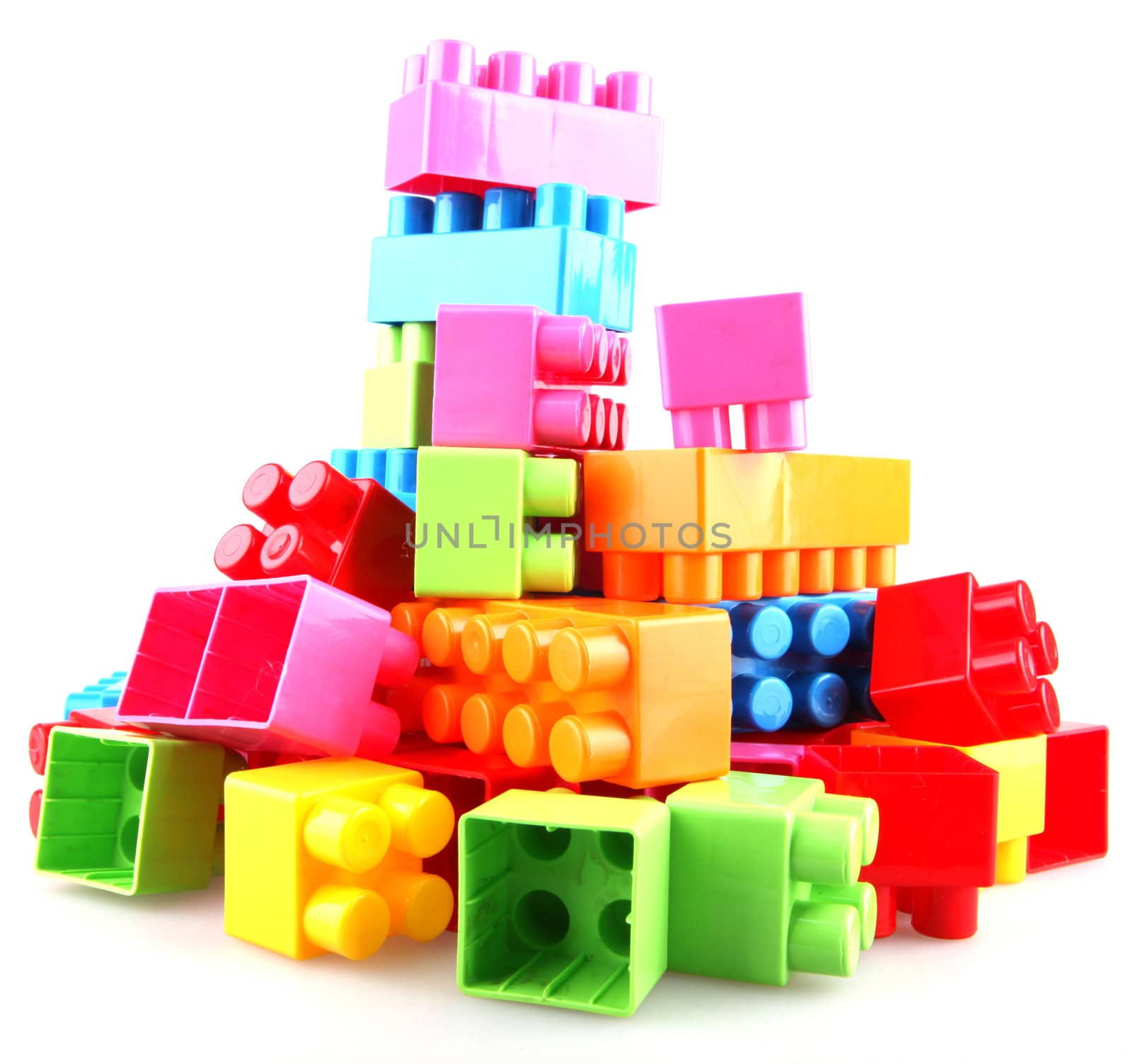 Plastic toy blocks on white background