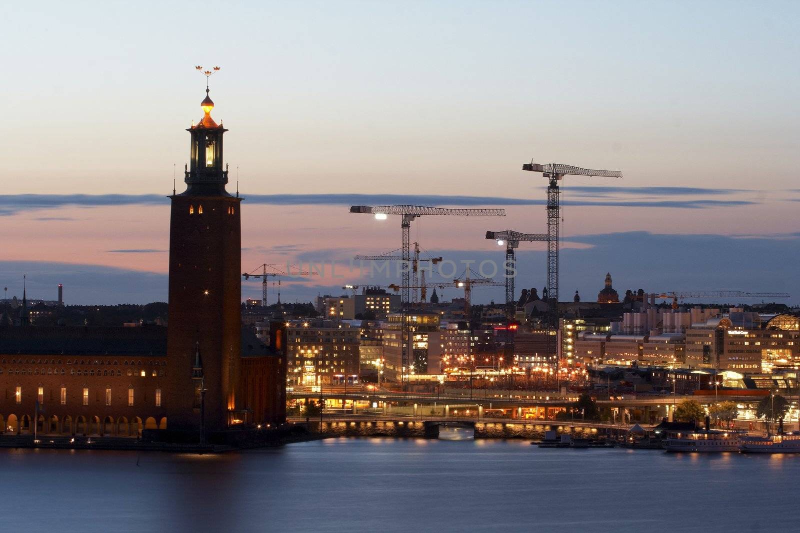 Old town of Stockholm and township at dusk by andrius