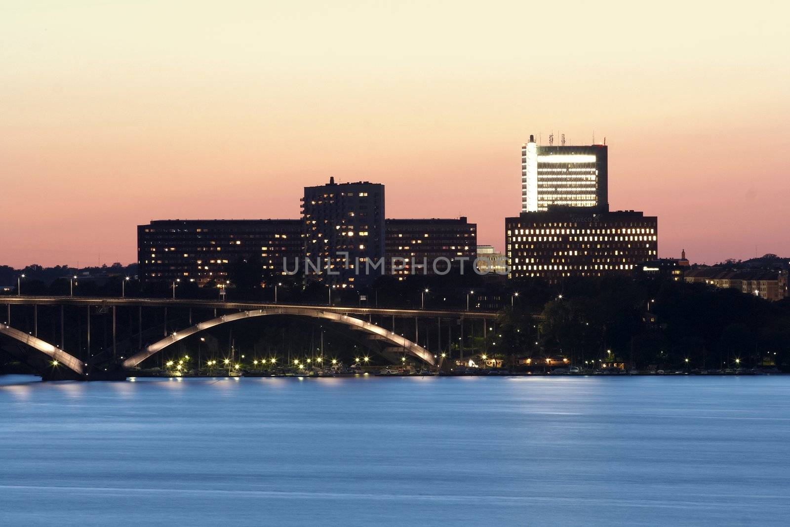 Bridge in Stockholm at dusk by andrius